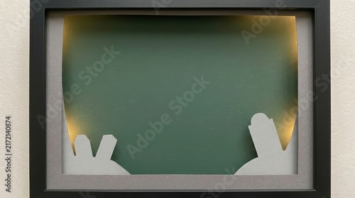 Paper cut rabbit silhouettes on green background Halloween 3D art