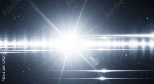 Bright white light flare exploding in the center with horizontal light streaks and scattered dust particles against a dark, deep blue space-like background, creating a cinematic lens effect