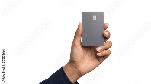 Quadro su tela Credit card gray blank plastic mockup held vertically in hand with chip for bank
