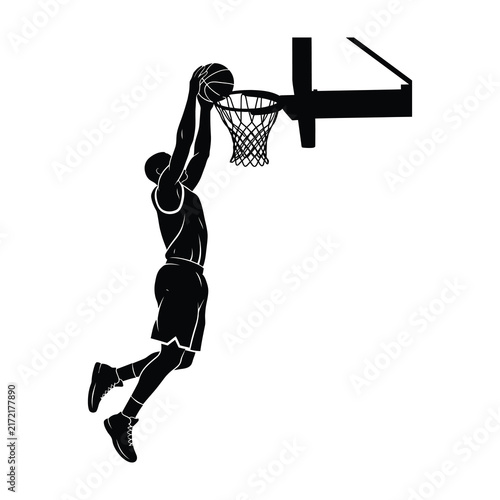 Basketball player silhouette dunking ball into hoop, sports action concept