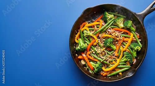 Top view of a cast iron skillet filled with delicious vegetable stir fry