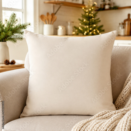 A cozy living room scene with a soft cushion on a sofa, perfect for autumn or winter home decor inspirations.