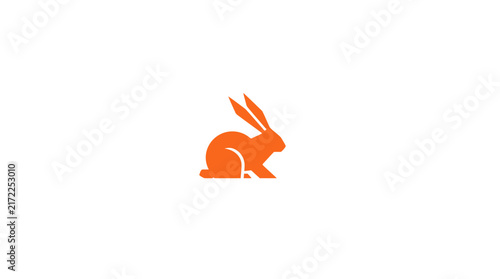 Solid orange rabbit silhouette jumping right.