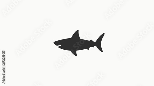 Silhouette of a shark swimming on white background.