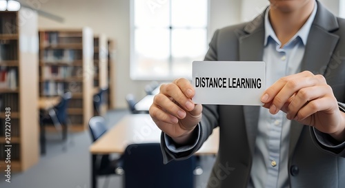 Academic professional presenting distance learning message in library with bright natural light for educational software marketing