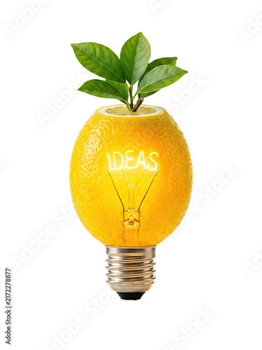 Creative lemon light bulb with green leaves and glowing “IDEAS” text, symbolizing fresh thinking, innovation, creativity, sustainable energy and eco-friendly solutions.