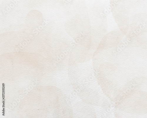 Soft ivory and beige watercolor texture with subtle translucent layers and delicate paper grain. Elegant minimal abstract background with a warm neutral palette.