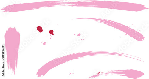 Set of pink paint brush strokes and ink splatters on a white background, featuring various curved lines and small droplet marks for texture