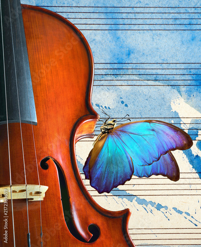 violin on the background of the sheet music. violin on blue watercolor backgr...