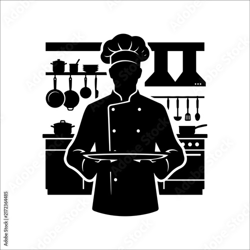 Chef holding a tray facing forward in a kitchen interior with chef portrait