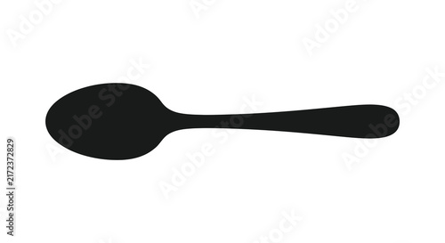 A black spoon shape is presented as a flat silhouette