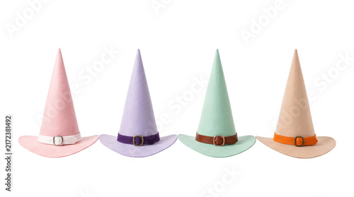 Quadro su tela Colorful Pastel Witch Hats Row Isolated on Black Background, Pastel Halloween Po