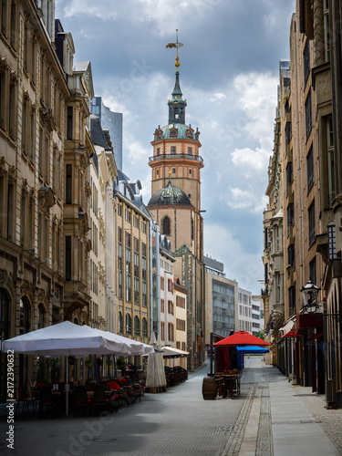 Historic street and St Nicholas Church in Leipzig Germany