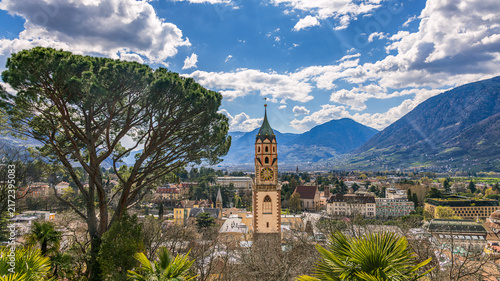 Obraz na plátne View over cityscape with Cathedral Saint Nikolaus of Merano, South tyrol