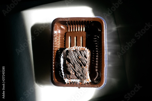 Close up of Chocolate Brownie in Plastic Food Container