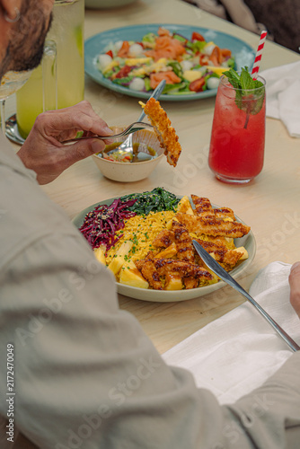 Gourmet breakfast with fresh croissants, toast and colorful fresh ingredients served on a table