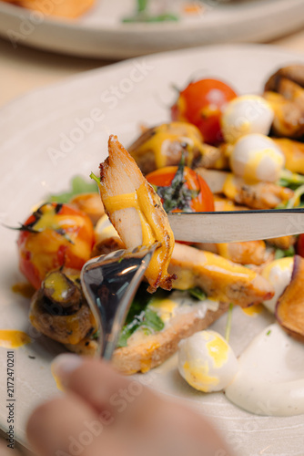 Gourmet breakfast with fresh croissants, toast and colorful fresh ingredients served on a table