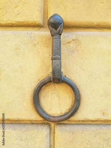 Antique Iron Ring Textured Stone Wall
