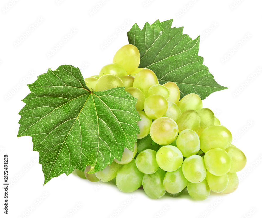 Fototapeta premium Bunch of grapes with green leaves isolated on white