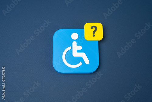 Fotografie Disability symbol and question mark