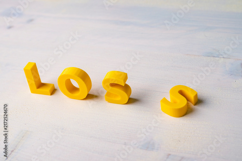 фотографія Financial loss, business failure and setback concept with fallen letter