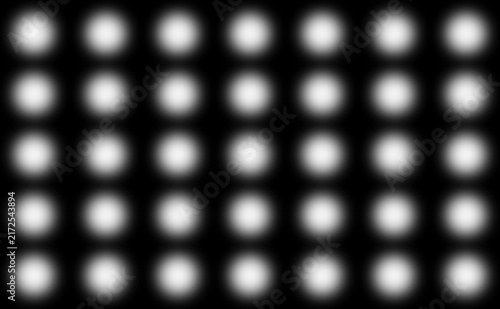 黒の背景にぼかし、グラデーションの効果がある光を発する白の色の円でドットの形の模様が並ぶデザインのイラストの壁紙