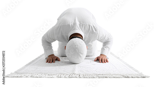 Muslim Man Performing Sujood Prayer on Islamic Prayer Mat Isolated on Transparent Background