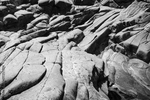 Black and White Volcanic Rock Formation with Cracks and Natural Texture