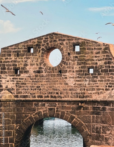 old brick wall
a historic stone structure, likely part of the Sqala du Port d'Essaouira fortifications in Essaouira, Morocco.