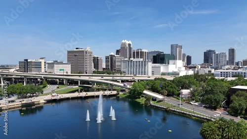 Still shot overlooking Lake Lucerne fountain and the downtown Orlando skyline in Orange County, Orlando, Florida, USA.