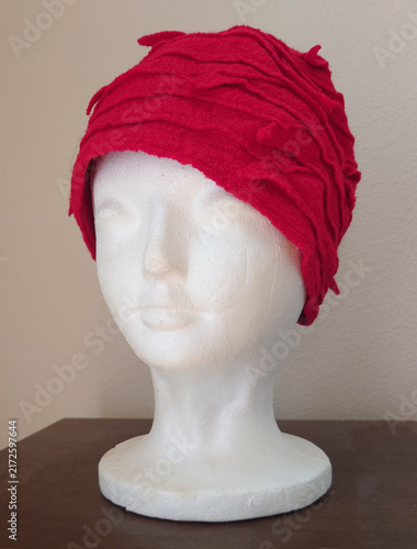 vintage red layered cloth cloche hat evoking flapper, Gatsby, speakeasy era