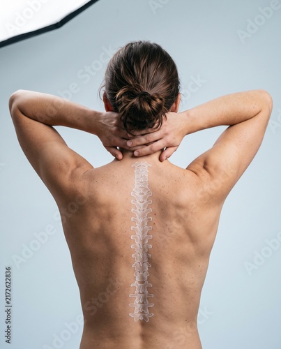 Woman Holding Neck with Highlighted Spine and Back Pain
