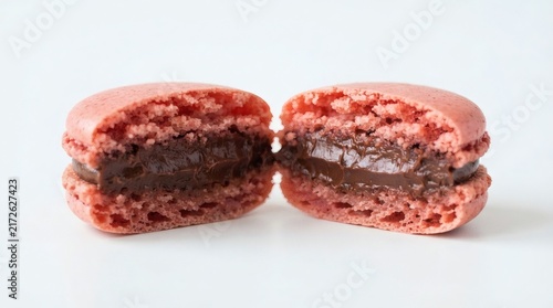 Single Macaron Cut Half Ganache Filling Ruffled Foot Pure White Background Extreme Close Up

