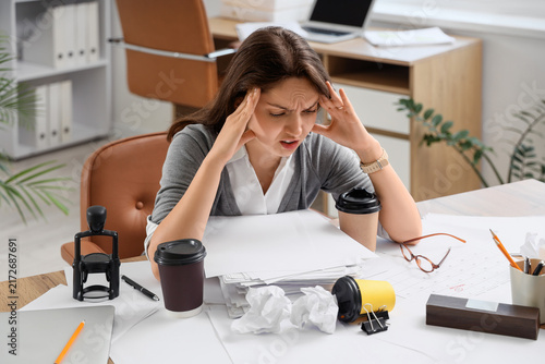 Burnout and workplace stress, exhausted woman overwhelmed by heavy workload a...