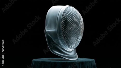 Futuristic glass fencing mask on a velvet covered table against a dark background, 3D render