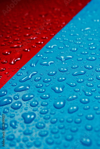 Red And Blue Dual Tone Surface With Water Drops Condensation Texture Full Frame Background