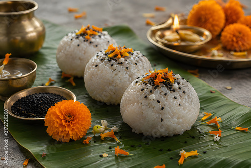 Pitru paksha ancestral offerings with flowers and sacred rituals
