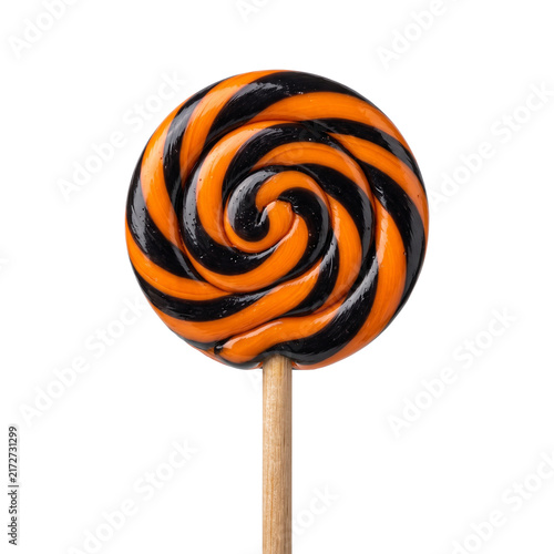 Colorful swirled lollipop on a wooden stick.