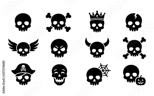 Bild auf Leinwand Set of black skull icons for halloween celebration featuring various designs lik