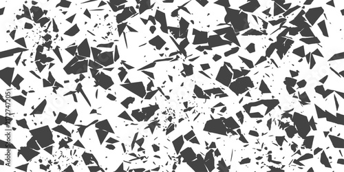 Картината върху платно Abstract geometric shards scattered across a white background with a monochrome