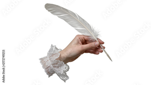 Quadro su tela Delicate white feather quill held by a hand with ornate lace cuff, isolated on t