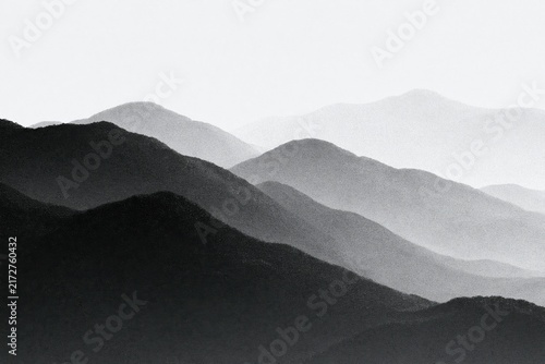 Minimalist black and white landscape with layered mountain silhouettes