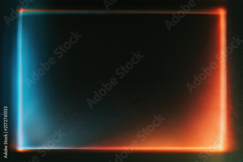Abstract glowing rectangular frame with blue and orange light leaks