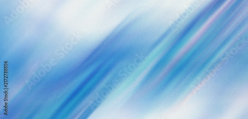 Abstract blue background with diagonal light streaks and a subtle grainy texture for design projects with texture throughout surface background with background