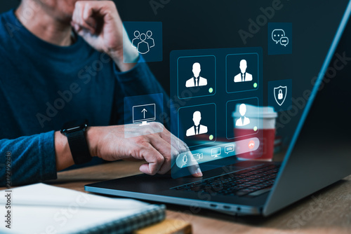 Canvas Print Person Joining Secure Online Video Conference on Laptop