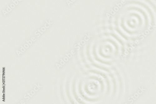 Minimalist white liquid ripples, soft cream water drop circles, clean aesthetic cosmetic background texture