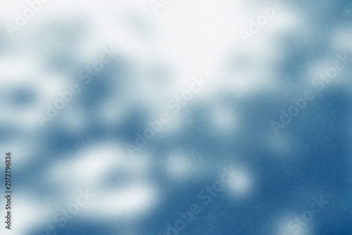 Cyanotype blue abstract background, blurred sun dappled light texture, ethereal cyan blue bokeh effect for artistic overlays