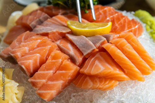 Obraz na płótnie Angled Overhead View of Fresh Salmon Sashimi Platter with Chopsticks