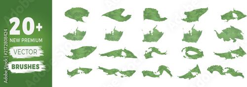 Collection of green artistic paint brush strokes and ink textures for design projects