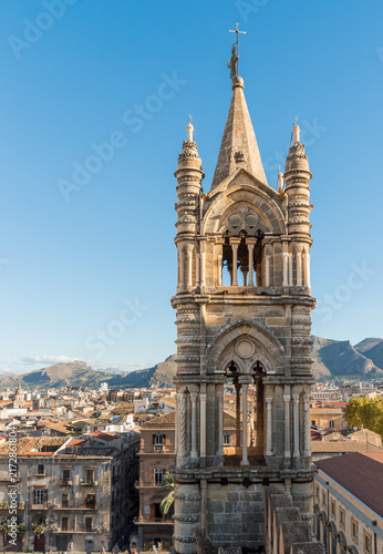 Tower of Palermo Cathedral rising above the rooftops of the historic center of Palermo, Sicily, Italy